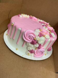 Pink drip with swirls and gold drags starting at $40.99 (feeds 30-40)