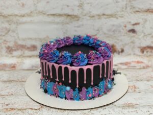 Blue and purple with pink drip starting at $21.99 (feeds 12-16