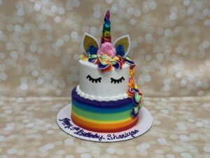 Rainbow unicorn tiered cake starting at $69.99 (feeds 30)