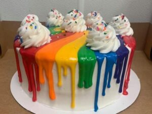 Rainbow drip cake starting at $26.99 (feeds 12-16)