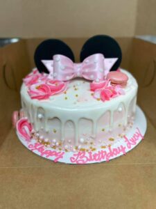 Minnie Mouse macaron cake starting at $45.99 (feeds 30-40)
